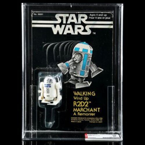 Lot # 74 - Canadian Carded Walking Wind-Up R2-D2 AFA 60 [Kazanjian Collection]