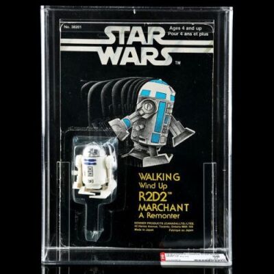 Lot # 74 - Canadian Carded Walking Wind-Up R2-D2 AFA 60 [Kazanjian Collection]