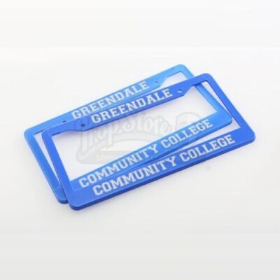Lot # 137 - Various Episodes: Two Greendale Community College License Plate Frames