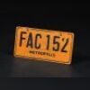 SUPERMAN II (1980) - Overturned Metropolis Car's License Plate