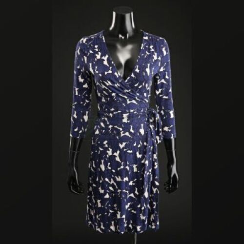 SEASON 1 EPISODE 9: "TROU NORMAND"<br>Alana Bloom's (Caroline Dhavernas) Blue Wrap Dress