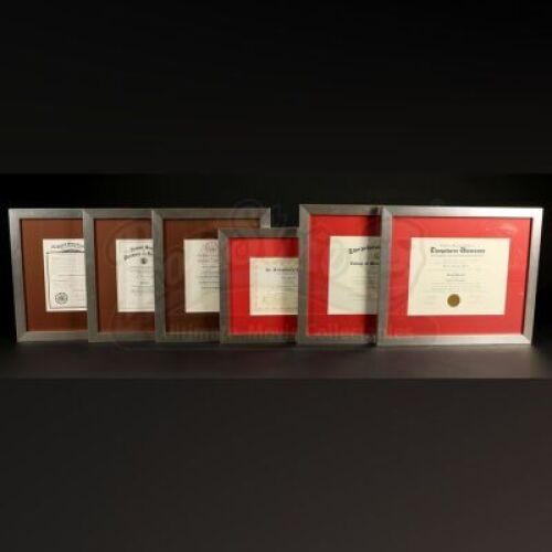 SEASON 1 EPISODE 10: "BUFFET FROID"<br>Dr. Sutcliffe's (John Benjamin Hickey) Framed Certificates