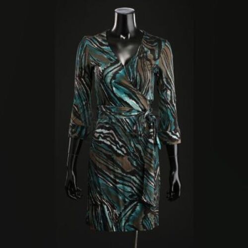 SEASON 1 EPISODE 11: "ROTI"<br>Alana Bloom's (Caroline Dhavernas) Turquoise Wrap Dress