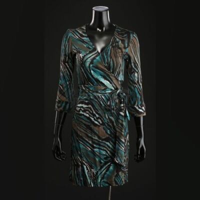SEASON 1 EPISODE 11: "ROTI"<br>Alana Bloom's (Caroline Dhavernas) Turquoise Wrap Dress