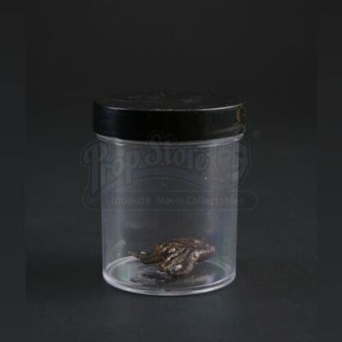 SEASON 1 EPISODE 12: "RELEVES"<br> Charred Comb Piece in Evidence Jar
