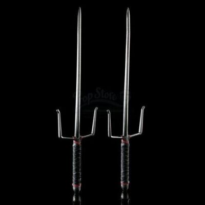 Lot # 177: Elektra Natchios' Red and Black-Handled Sais