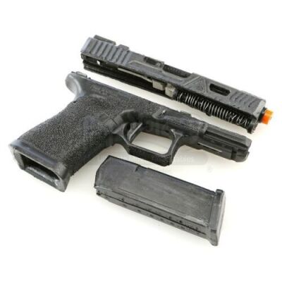 Lot # 276: Benjamin 'Dex' Poindexter's Rubber Glock Pieces
