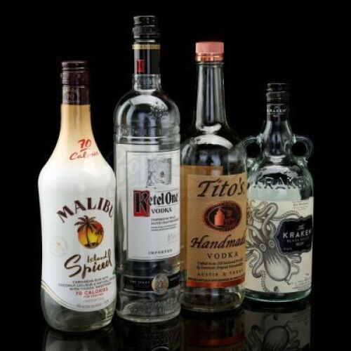 Lot # 533: Set of Four Harlem's Paradise Alcohol Bottles