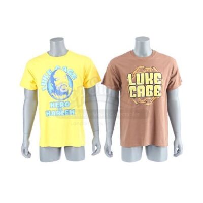 Lot # 579: D.W. Griffith's Pair of Luke Cage Novelty Shirts