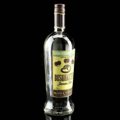 Lot # 625: John 'Bushmaster' McIver's Rum Bottle