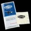 Lot # 664: Rand Enterprises Airline Safety Brochure and Rand Branded Napkin