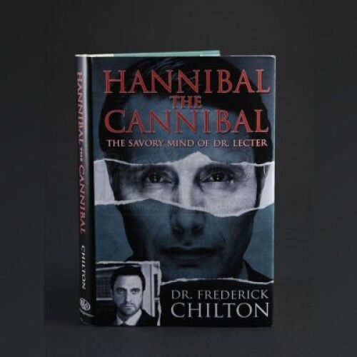 SEASON 3 EPISODE 12: "THE NUMBER OF THE BEAST IS 666"<br>Frederick Chilton's (Raul Esparza) Hannibal the Cannibal Book