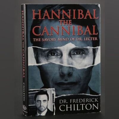 SEASON 3 EPISODE 12: "THE NUMBER OF THE BEAST IS 666"<br>Frederick Chilton's (Raul Esparza) Hannibal the Cannibal Book
