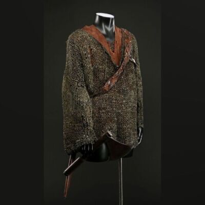 Mr. Bradley's (Kit Harington) Sweater, Hooded Vest, and Weapons