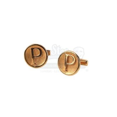 Lot #63 - AUSTIN POWERS: THE SPY WHO SHAGGED ME (1999) - Austin Powers' (Mike Myers) Cufflinks