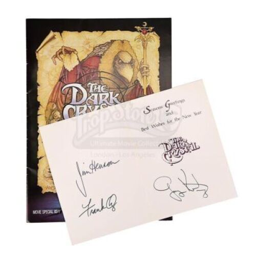 Lot #222 - THE DARK CRYSTAL (1982) - Jim Henson, Frank Oz and Gary Kurtz Autographed Card and Portfolio Book