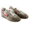 Lot #287 - FORREST GUMP (1994) - Forrest Gump's (Tom Hanks) Screen-Matched Bus Stop Shoes and Socks with Continuity Photo