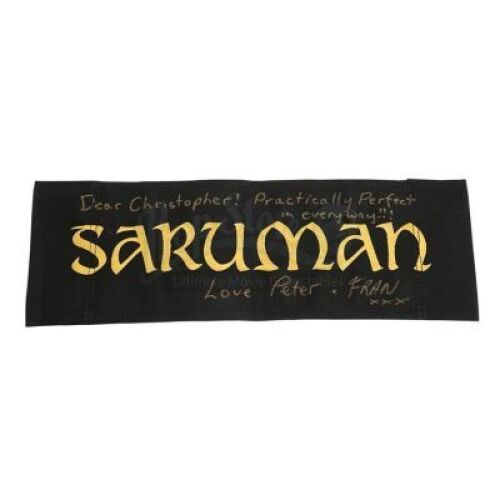Lot #512 - THE LORD OF THE RINGS (2001-2003) - Sir Christopher Lee Estate Collection: Saruman's (Christopher Lee) Chair Back Autographed by Peter Jackson
