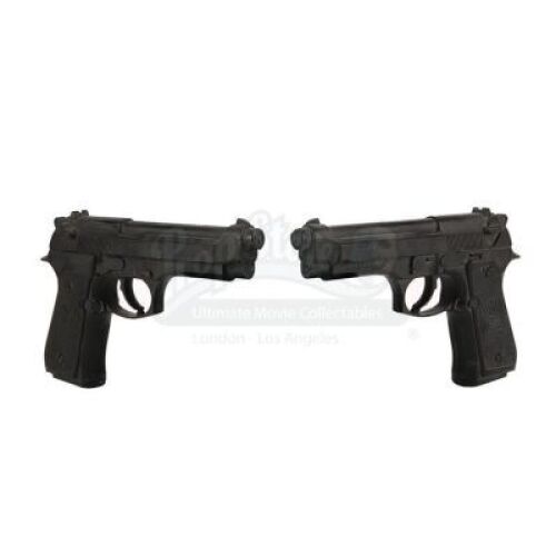 Lot #527 - THE MATRIX (1999) - Neo's (Keanu Reeves) Pair of Beretta Pistols