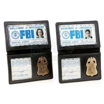 Lot #897 - THE X-FILES (TV SERIES, 1993 - 2002) - Fox Mulder's (David Duchovny) and Dana Scully's (Gillian Anderson) FBI Badges