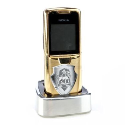 Lot # 111: JOHN WICK: CHAPTER 3 - PARABELLUM - The Adjudicator's High Table Cellphone and Charger
