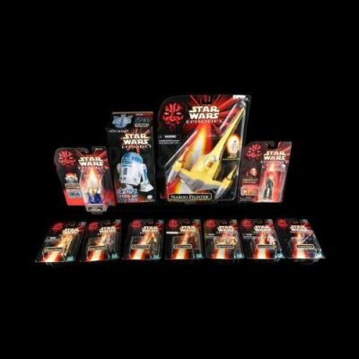 Lot # 552 - Action Figures and Wind Up Tin Toy
