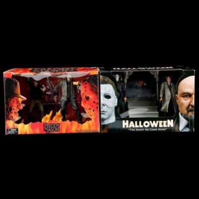 Lot # 671: Two Jason Voorhees Figures, Halloween Diorama, and Freddy vs. Jason Diorama - Sealed
