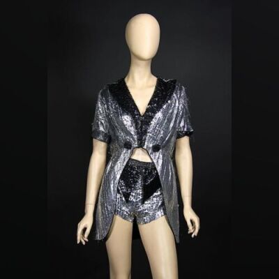 INDIANA JONES AND THE TEMPLE OF DOOM (1984) - Opening Scene Dancer Silver and Black Jacket and Hotpants