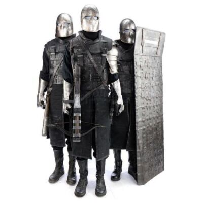 Lot # 112: ROBIN HOOD (2018) - Three Crossman Guard Costumes with Weaponry