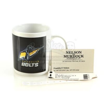 Lot # 150: Marvel's Daredevil (TV Series) - Set of Franklin 'Foggy' Nelson's Accessories