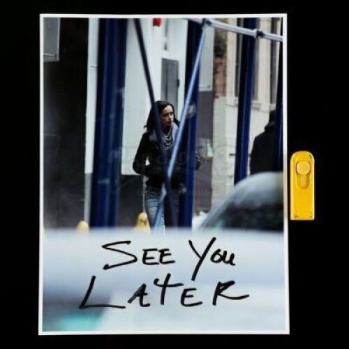 Lot # 261: Marvel's Jessica Jones (TV Series) - Kilgrave's 'See You Later' Photo and Flash Drive