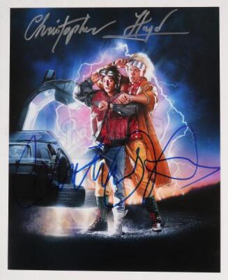 Lot #81 - BACK TO THE FUTURE PART II (1989) - Michael J. Fox and Christopher Lloyd Autographed Photo