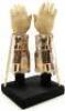 Lot #481 - MASTERS OF THE UNIVERSE (1987) - Skeletor's (Frank Langella) Light-Up Goldtone Gauntlets