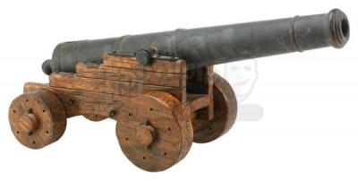 Lot #524 - PIRATES OF THE CARIBBEAN: DEAD MAN'S CHEST (2006) - Longdeck Cannon Miniature