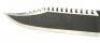 Lot #545 - RAMBO: FIRST BLOOD PART II (1985) - Jimmy Lile First Edition Rambo (Sylvester Stallone) First Blood Part II Knife WIth Black Sheath and Sharpening Stone #8 - 12