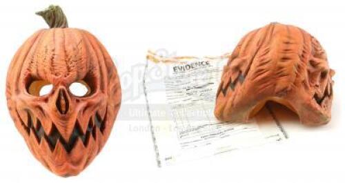 Lot #822 - TRICK (2019) - Pumpkin Mask with Evidence Bag