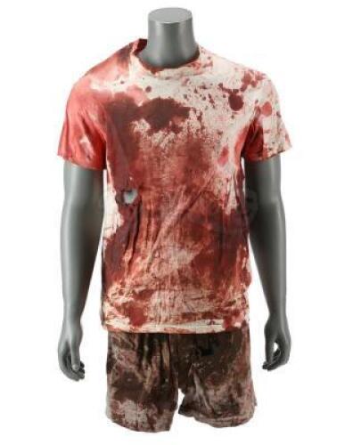 Lot #576 - SAW (2004) - Jigsaw's (Tobin Bell) Screen-Matched Bloodied "Hello Zep" Costume