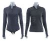 Lot #58 - Marvel's Agents of S.H.I.E.L.D. - Pair of Melinda May's Stunt S.H.I.E.L.D. Shirts - 2