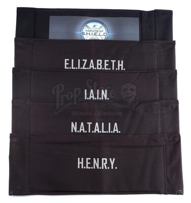 Lot #207 - Marvel's Agents of S.H.I.E.L.D. - Leo Fitz, Jemma Simmons, Alphonso 'Mack' Mackenzie, and Elena 'Yo-Yo' Rodriguez Cast Member Chairbacks with Additional Chairback