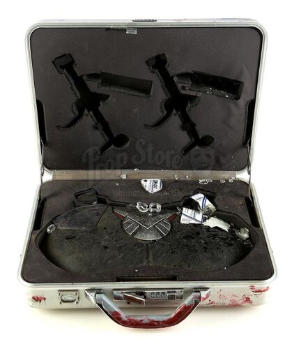 Lot #273 - Marvel's Agents of S.H.I.E.L.D. - Jeffrey Mace's Bloodied Patriot Briefcase with Armor Piece