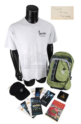 Lot #315 - HARRY POTTER: VARIOUS PRODUCTIONS - Collection of Crew Gifts, Autographed Book and Screening Tickets