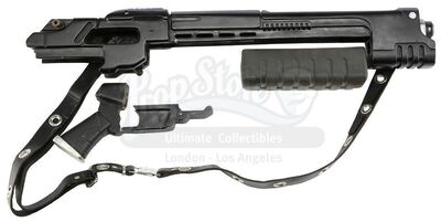 Lot #424 - JUDGE DREDD (1995) - Judge Fargo's (Max von Sydow) Screen-Matched Shotgun Components