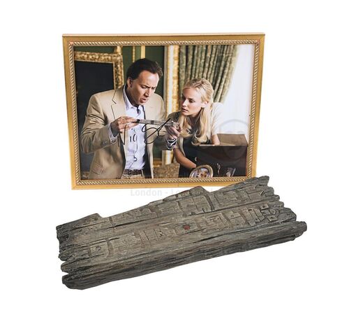Lot #530 - NATIONAL TREASURE: BOOK OF SECRETS (2007) - Resolute Desk Wooden Puzzle Piece