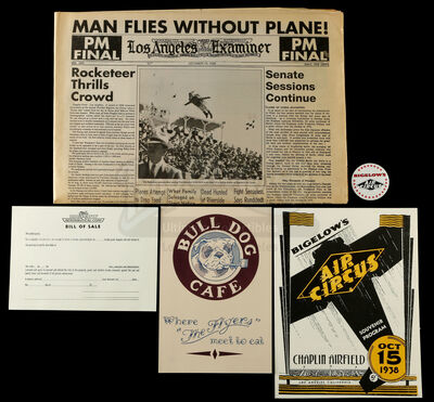 Lot #593 - THE ROCKETEER (1991) - Bulldog Cafe Menu, "Rocketeer Thrills Crowd" Newspaper, and Bigelow's Air Circus Memorabilia