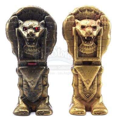 Lot #598 - THE RUNDOWN (2003) - Hero Gato Statue and Distressed Gato Statue