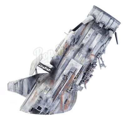 Lot #715 - STAR WARS: A NEW HOPE - SPECIAL EDITION (1997) - Screen-matched Dowager Queen Crashed Spaceship Model Miniature