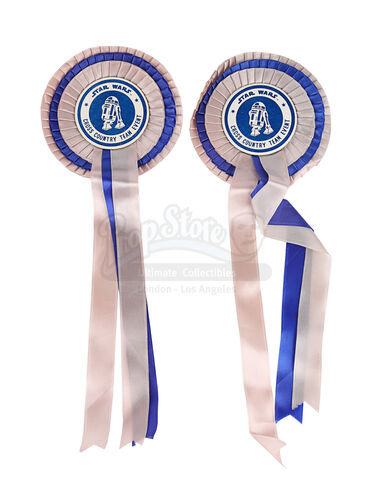 Lot #729 - STAR WARS: THE EMPIRE STRIKES BACK (1980) - Cross-Country Event R2-D2 Rosettes