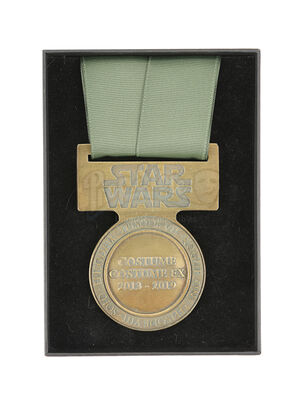 Lot #759 - STAR WARS: THE 
CONCLUDING TRILOGY (2015-2019), ROGUE ONE: A STAR WARS STORY (2016) AND SOLO: A STAR WARS STORY (2018)
)
- Costume Department "Medal of Bravery" Crew Gift