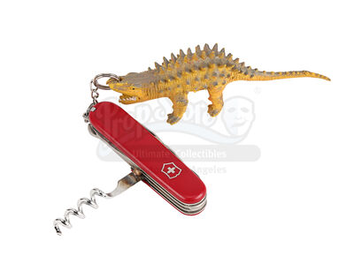 Lot #850 - TRUE ROMANCE (1993) - Alabama's (Patricia Arquette) Hero Stabbing Swiss Army Knife and Dinosaur Keychain