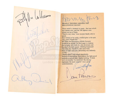 Lot #724 - STAR WARS: THE EMPIRE STRIKES BACK (1980) - Main-cast Autographed Paperback Book